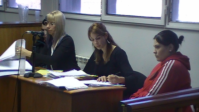 Los acusados junto a sus defensores