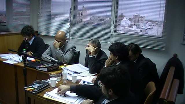 Los defensores durante la audiencia 